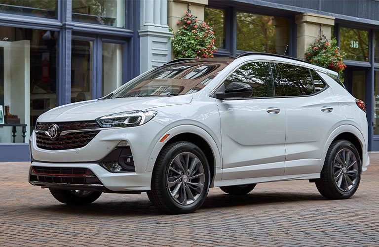 A 2021 Buick Encore GX parked outside near a building