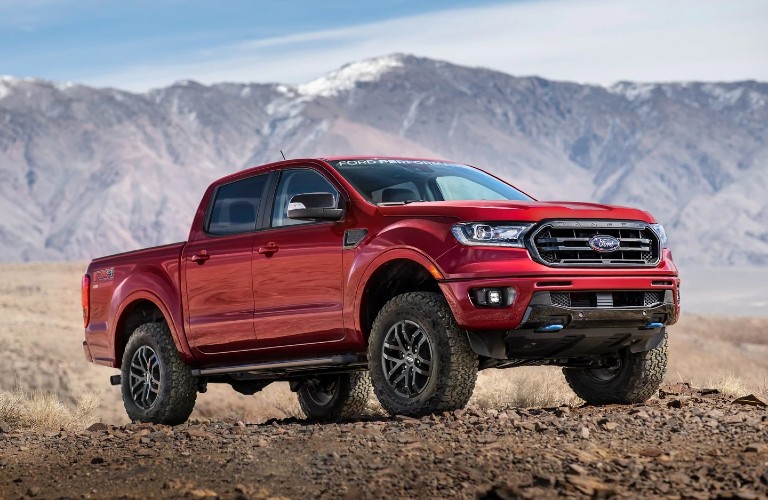 Red Ford Ranger against a landscape