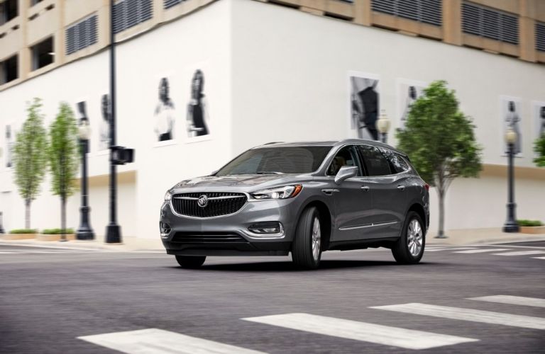 The 2021 Buick Enclave standing at the intersection.