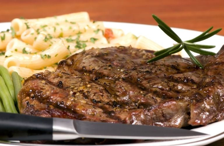 A steak served with pasta