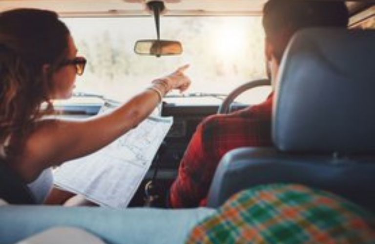 couple navigating on road trip