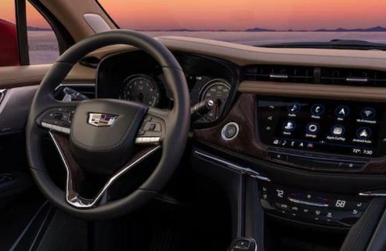 Steering wheel and infotainment system view of the 2023 Cadillac XT6