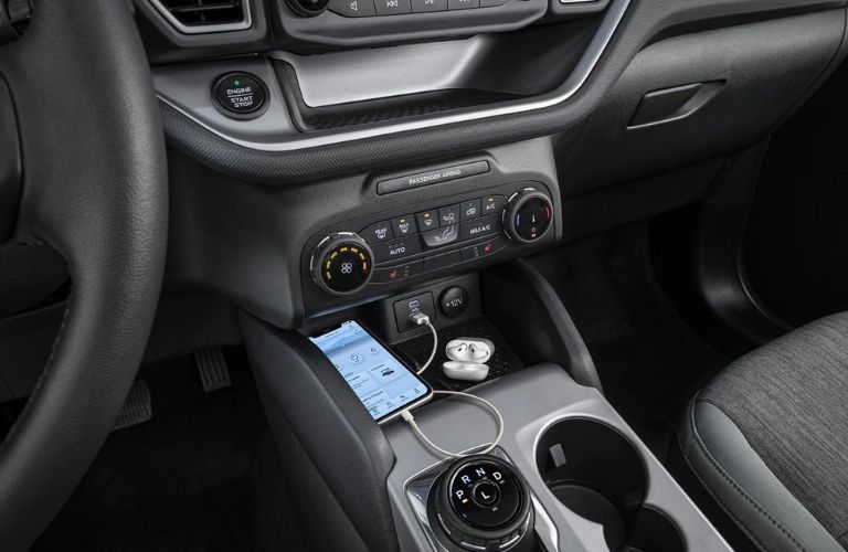 A smartphone getting charged in the 2023 Ford Bronco Sport. 