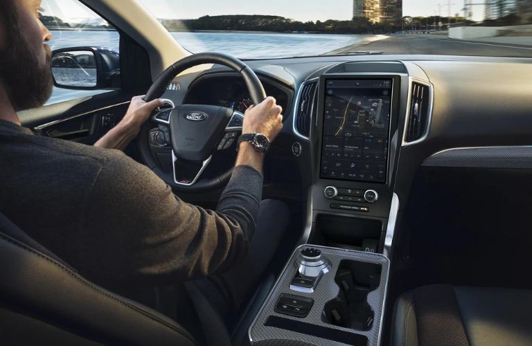 Inside view of a person driving the 2023 Ford Edge.
