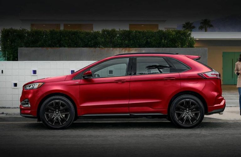 One red color 2024 Ford Edge is parked.