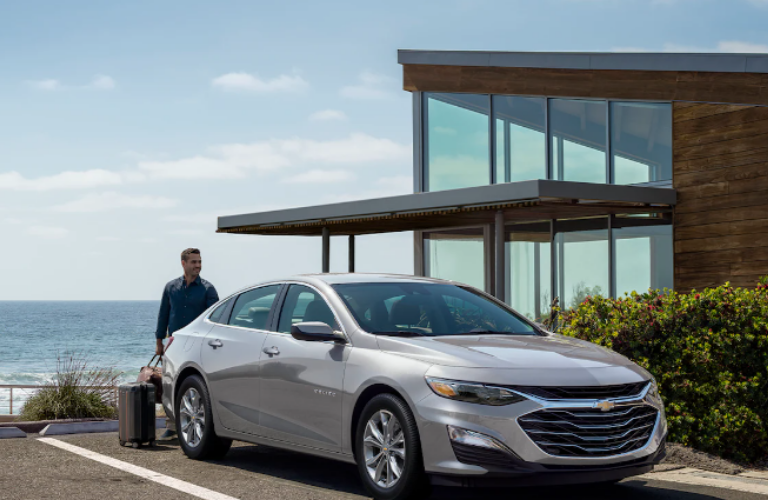  2024 Chevrolet Malibu in front of a building 