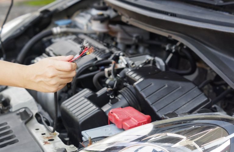 Technician checking an engine