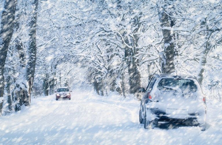 Vehicle in the middle of a snow storm