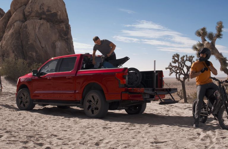 Unloading motorcycle from the Ford F-150 Lightning®